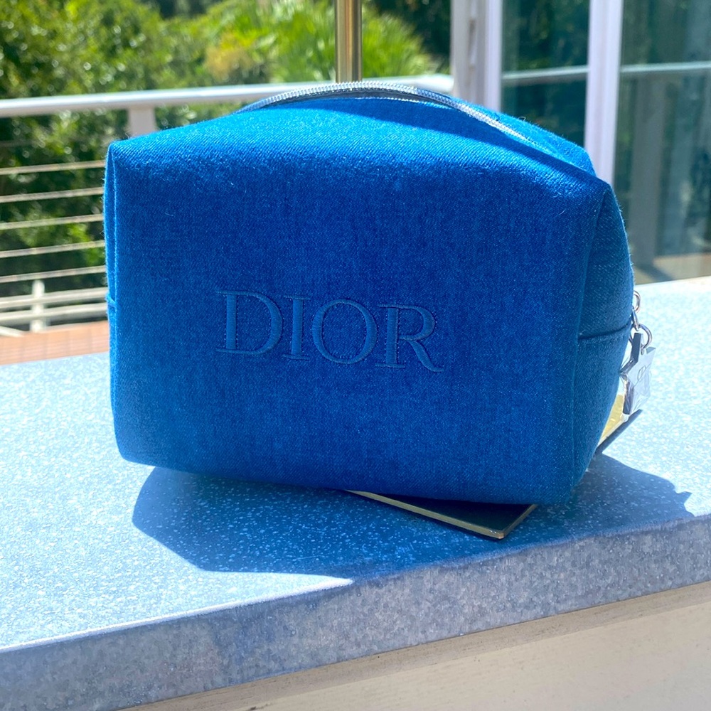 Dior denim make-up pouch.